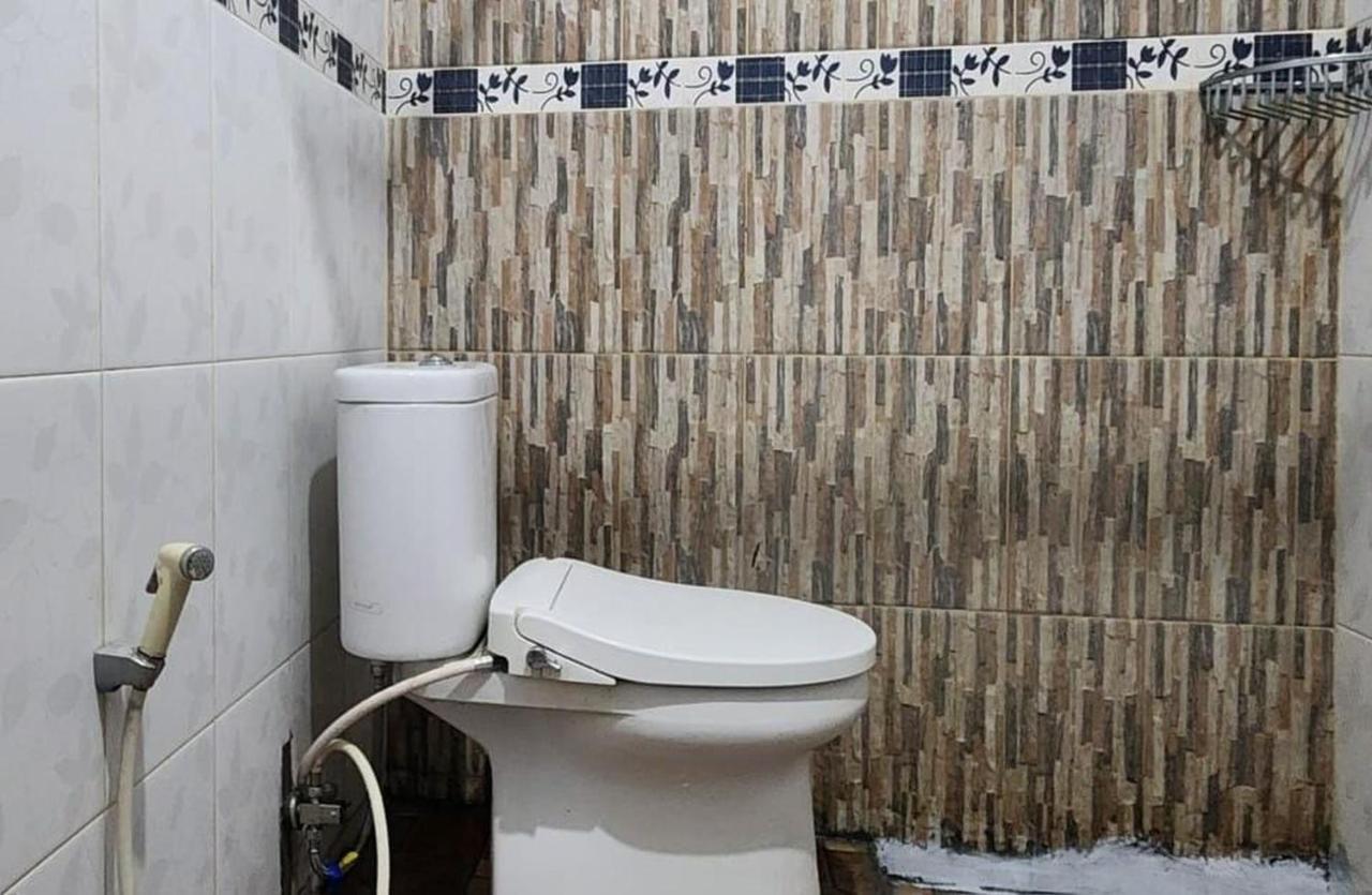 Permata Homestay Kotamobagu Mitra Reddoorz Exterior foto